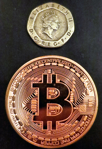 Bit-coin heads Tags