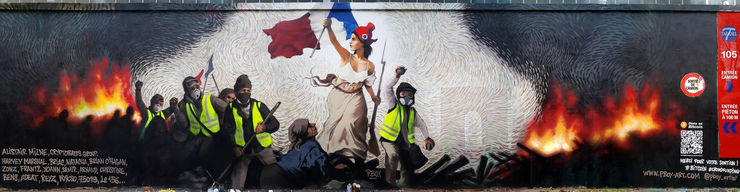 Street artist hides $1,000 in btc inside a mural depicting paris protests Street artist hides $1,000 in btc inside a mural depicting paris protests