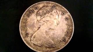 Canadian silver dollar 1966 difference between expensive coin and cheap coin and size comparison Canadian silver dollar 1966 difference between expensive coin and cheap coin and size comparison