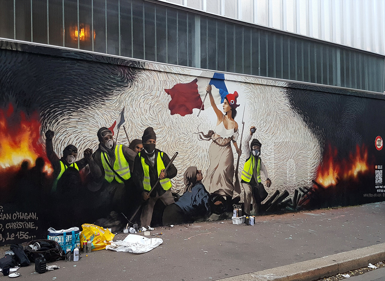 Street artist hides $1,000 in btc inside a mural depicting paris protests Street artist hides $1,000 in btc inside a mural depicting paris protests