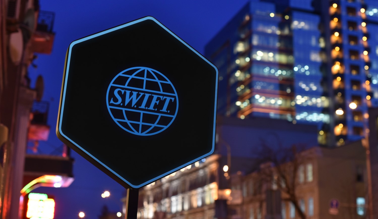 Swift teams up with major banks, sgx to trial blockchain voting Swift teams up with major banks, sgx to trial blockchain voting