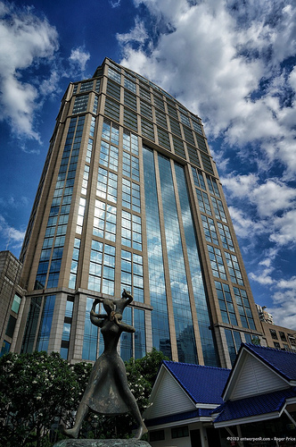 Mother and child at play - that is emporium in the background Tags