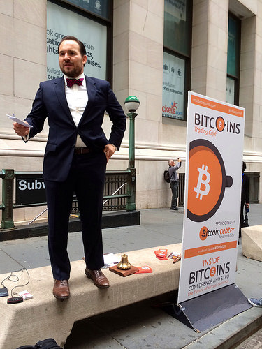 A live bitcoin auction taking place across from the nyse. Tags