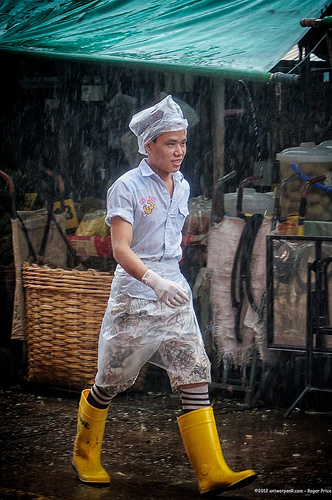 When the rain comes, put a poly bag on your head - then stroll confidently around the market in your yellow wellies! Tags