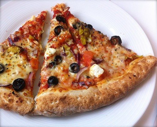 Tasty bitcoin pizza close-up. Tags